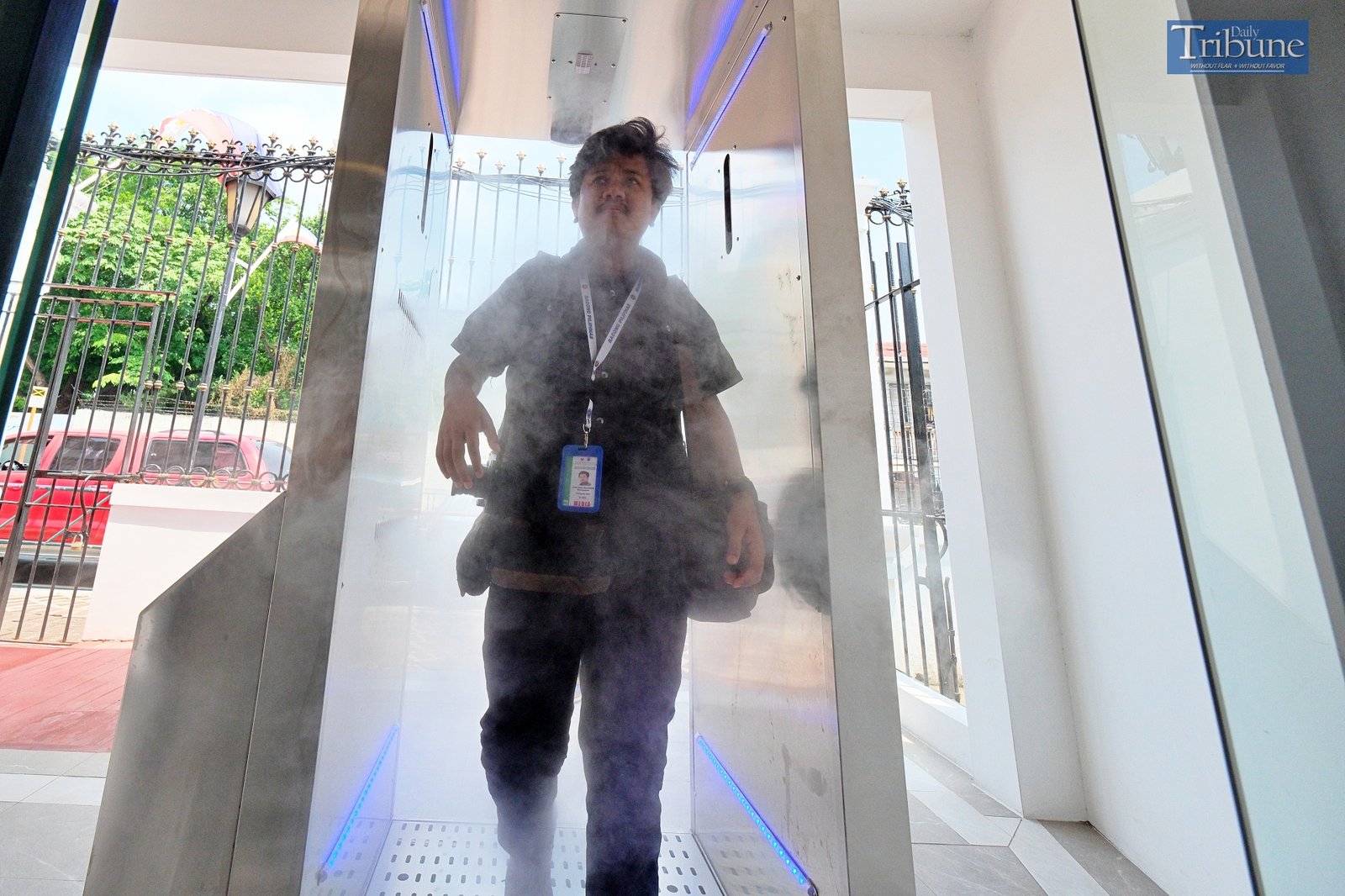 TRIBUNE-coviddisinfectiondoor